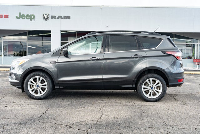 Used 2018 Ford Escape SE with VIN 1FMCU9GD5JUA63874 for sale in Poteau, OK